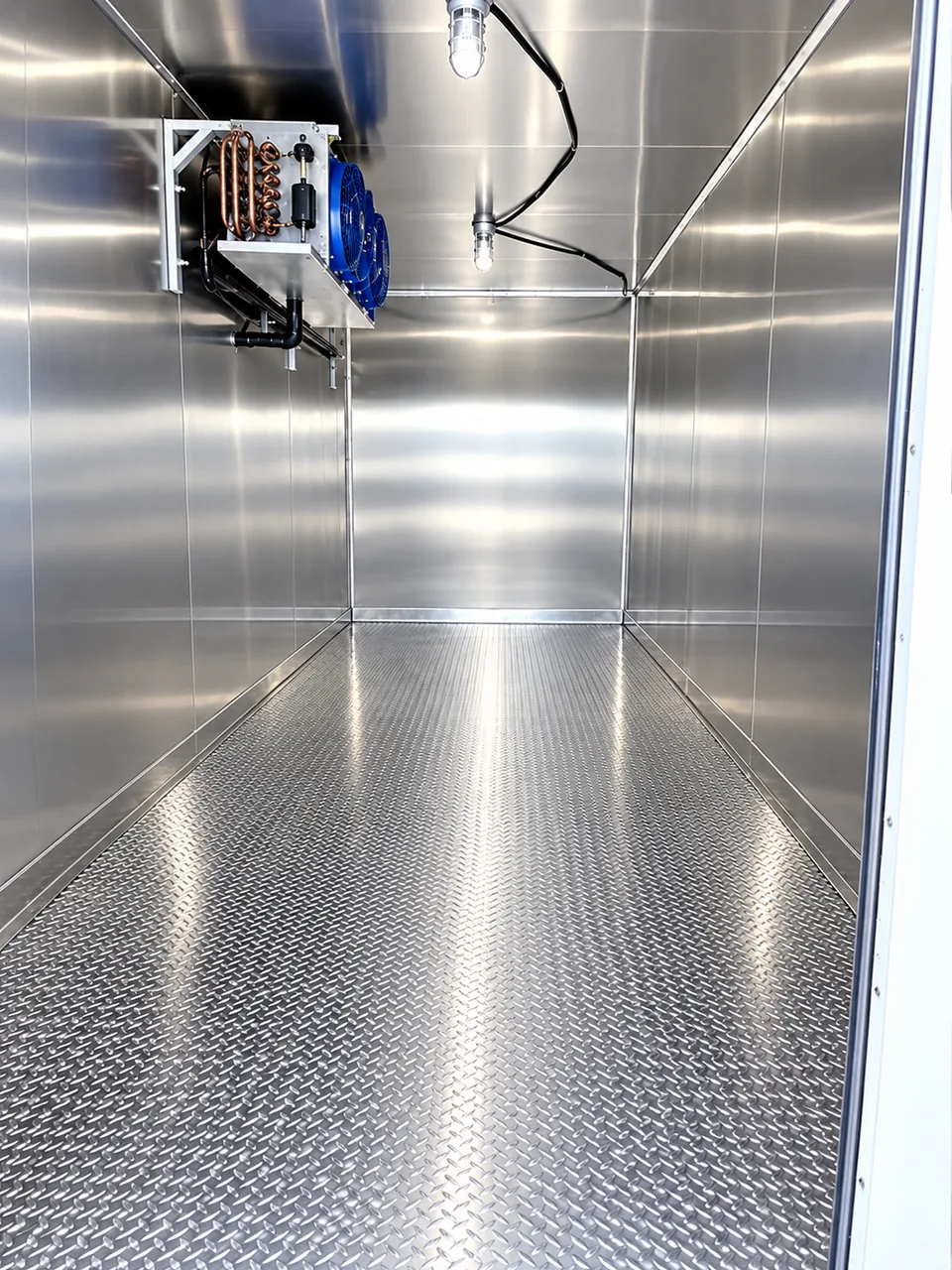 Insulated refrigeration trailer interior with cooling equipment