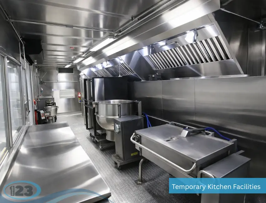 Commercial kettles, ventilation and preparation counters inside a mobile kitchen